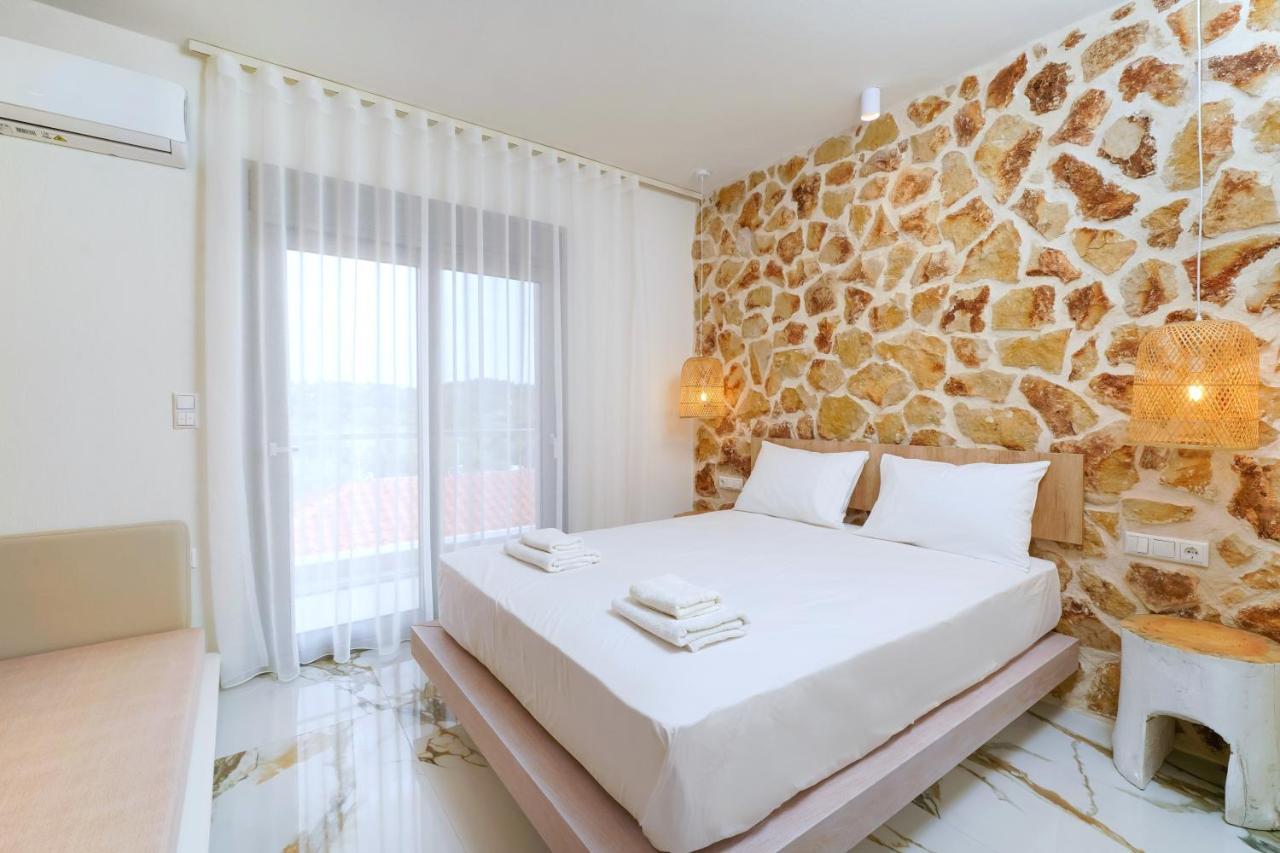 Athina Palace Luxurious Appartments Potos Esterno foto
