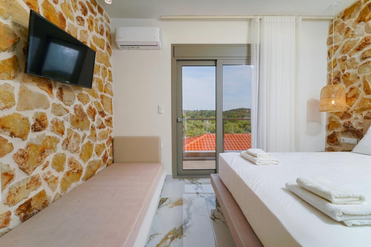 Athina Palace Luxurious Appartments Potos Esterno foto