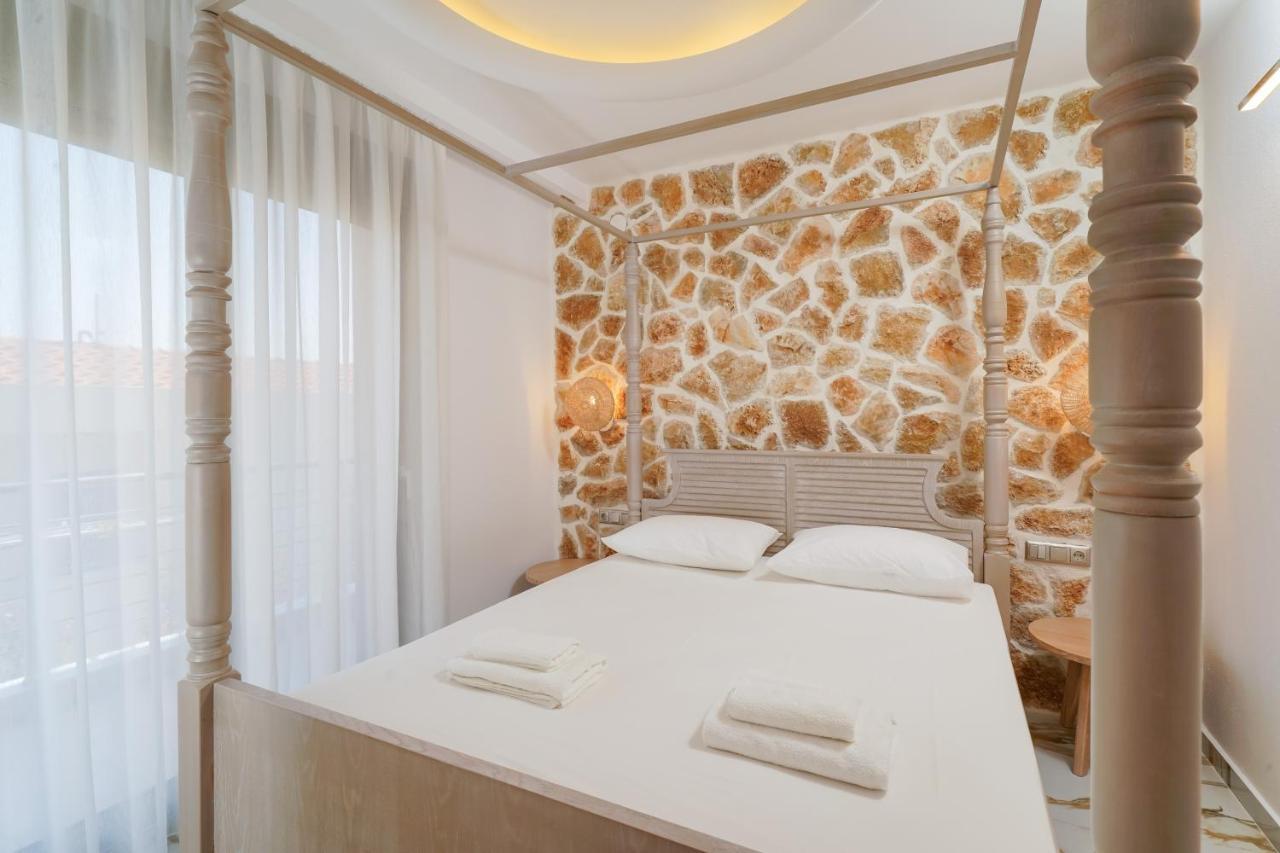 Athina Palace Luxurious Appartments Potos Esterno foto