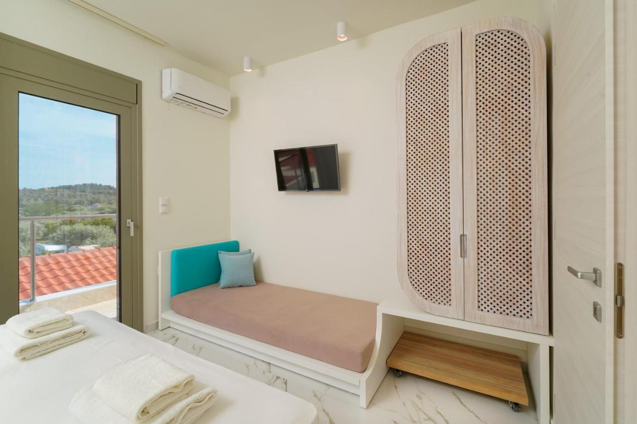 Athina Palace Luxurious Appartments Potos Esterno foto